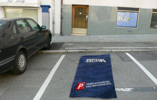 Parkplatzschützerstrandtuch